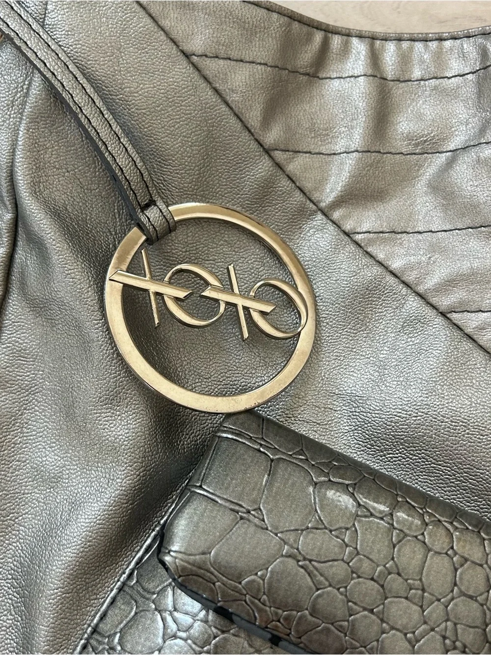 silver xoxo shoulder bag